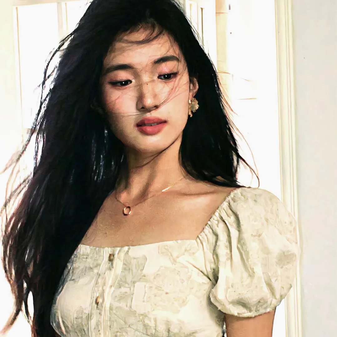 绿杨移作两家春